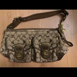 Brown, leather Coach purse.
